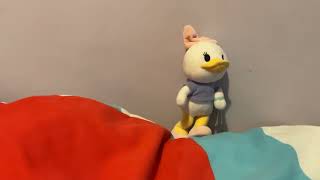 Daisy Duck singing die with a smile