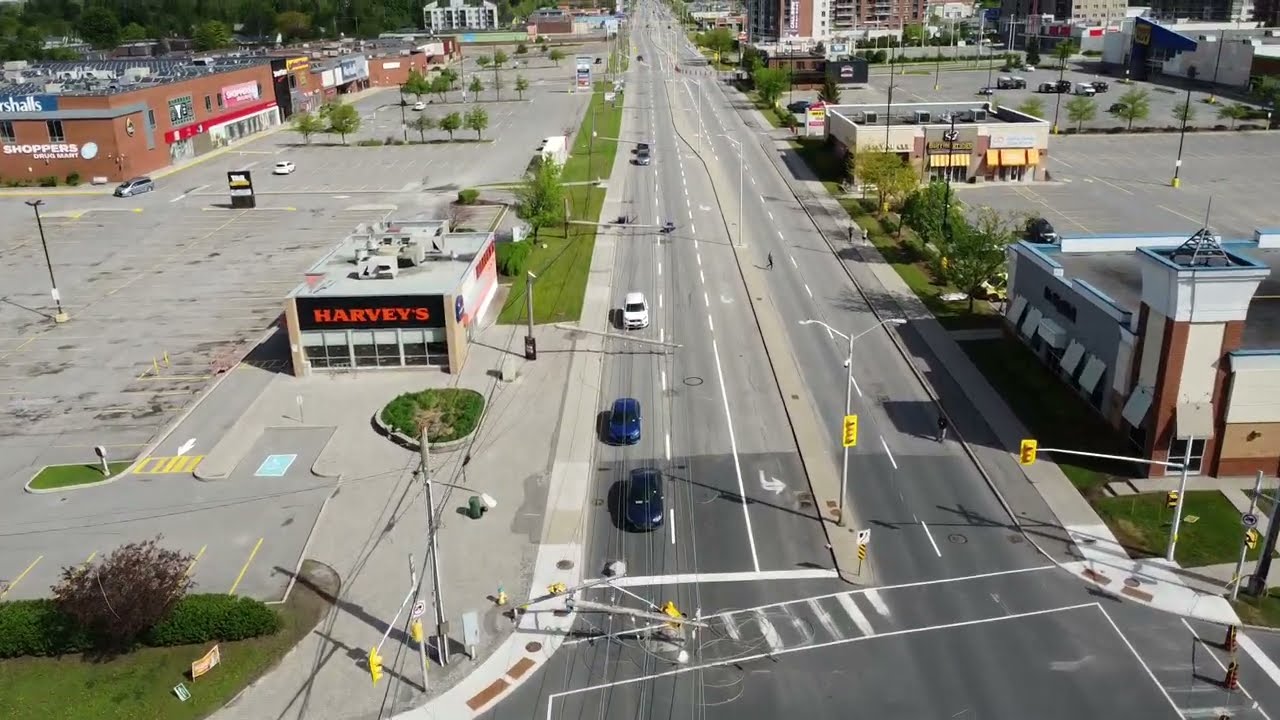 Snapped Power Poles and Trapped cars from Derecho on March 21, 2022 on Merivale Rd, Ottawa