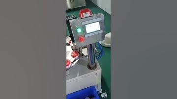 Low speed edible oil bottle cap top base fitting assembly machine