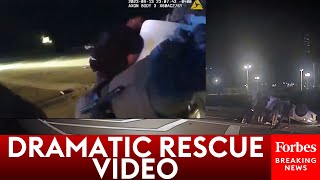 DRAMATIC BODYCAM VIDEO: Police Officer, Good Samaritans Lift Car Off Of Pinned Driver
