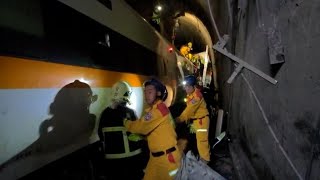 video: Taiwan train crash: at least 51 dead after carriages derail in tunnel