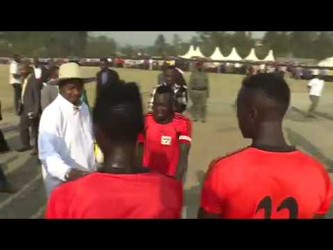 Museveni playing foot ball in Fort portal after commissioning construction of new stadium