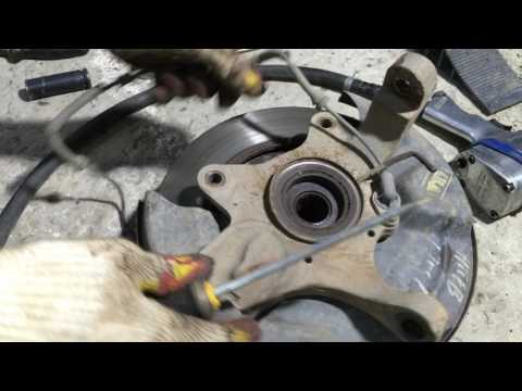 Меняем сальники передней ступицы и подшипник привода на СангЕнг рекстон 2006 года SsangYong Rexton