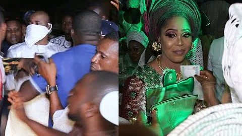 See How MC Oluomo's Fans Mob Him As He Steps Out As His Wife Show Off Her Dance Moves