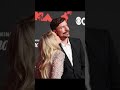 Mr beast gets a smooch from fiancee Thea Booysen on the red carpet at the 2025 MTV VMAs.
