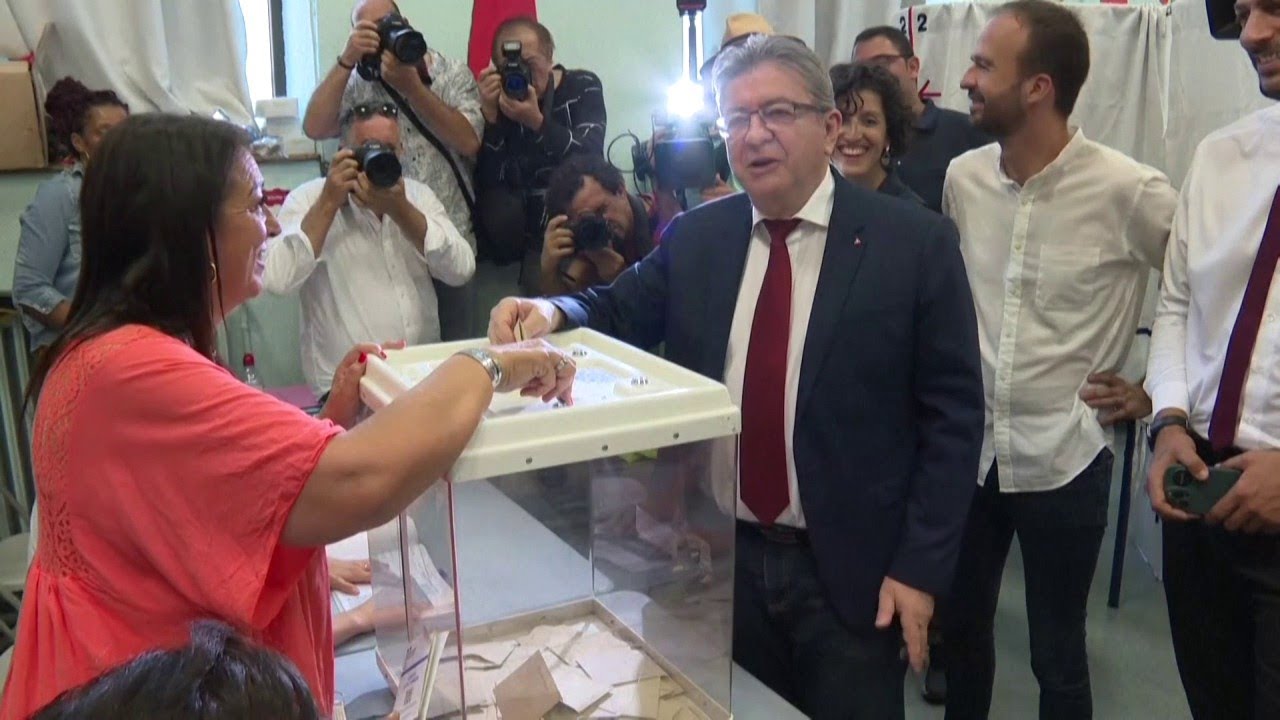 French political leaders vote in crunch parliamentary election