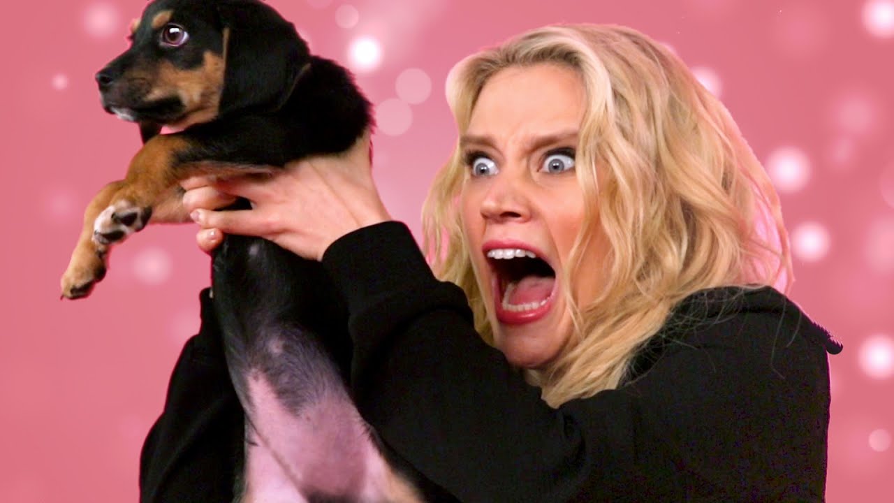 Kate McKinnon Plays With Puppies
