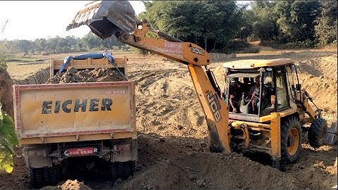 JCB Backhoe Loader Loading A Soil In Tripper Dump - JCB Cutting Soil in Village Fild