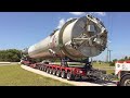 How does SpaceX transport the Falcon 9?