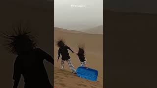 Electrically charged clouds in desert make tourists' hair stand on end