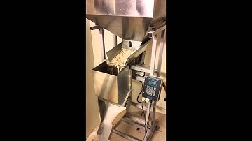 Logical Machines S-4 Weigh-Fill System Running 8 Oz. Rice Puffs