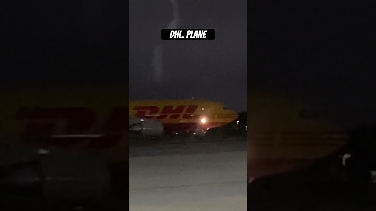 Night View DHL Plane 