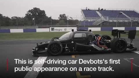 Driverless Roborace car speeds around Donington   BBC News