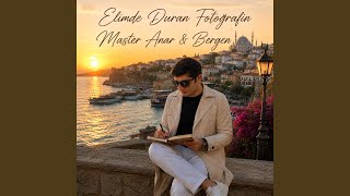 Elimde Duran Fotoğrafın - Master Anar