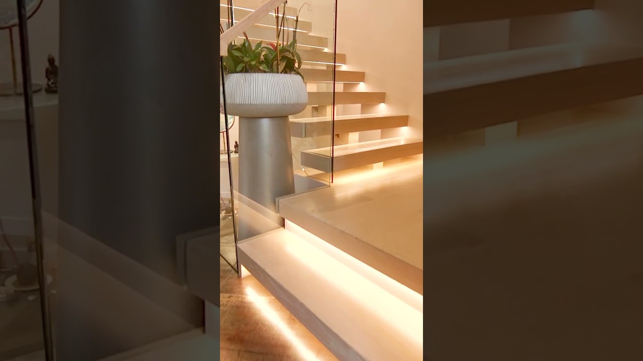 Illuminated Floating Staircase in Boca Raton Renovation 