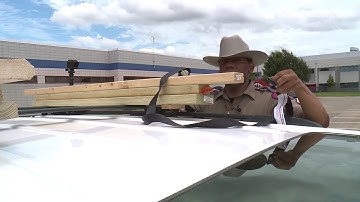 How to properly secure items on the top of your car using a ratchet strap