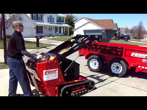 Equip Rental and Sales - Dingo Rental loading into Dump Trailer--St Charles,St Peters,Ofallon,Mo