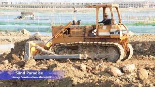 Komatsu D58P Bulldozer Pushing Soil