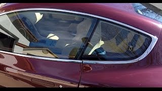 recalibrating / resetting  the door window glass auto drop positioning on an aston martin db9
