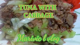 Cooking time ginisang tuna with cabbage my own version.