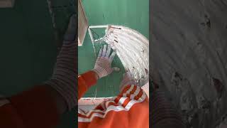 the process of installing flexible board pieces on the ceiling corners in the living room #popular