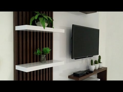 Video: Desain Dinding Dengan TV Di Ruang Tamu (52 Foto): Cara Menghias Dinding, Pada Ketinggian Berapa Untuk Menggantung TV Dari Lantai, Ide Desain