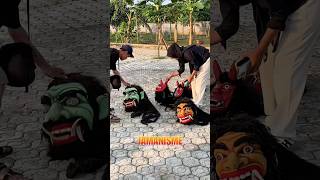 Kak Ayis adjusts the mask position