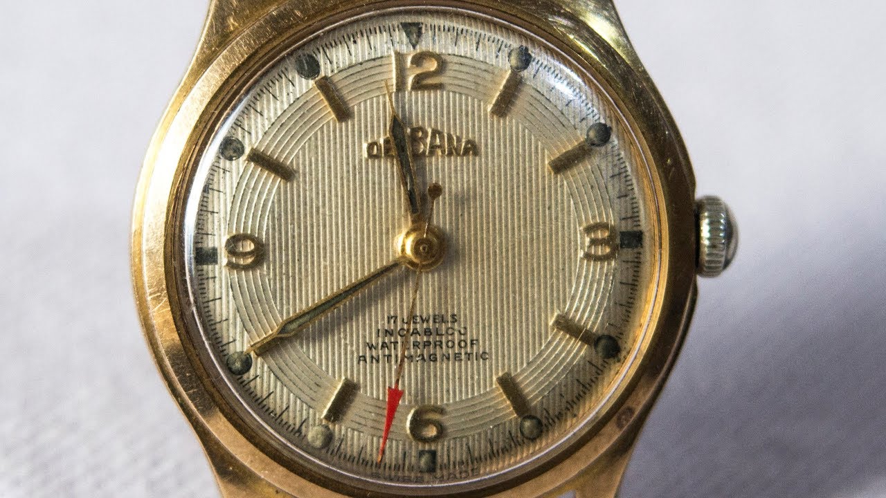 Часы DELBANA . Позолота.