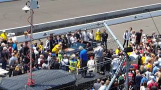 Sam Schmidt brings the ARROW car back into the pits at IMS