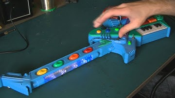 Circuit Bent Poundstretcher Guitar by freeform delusion