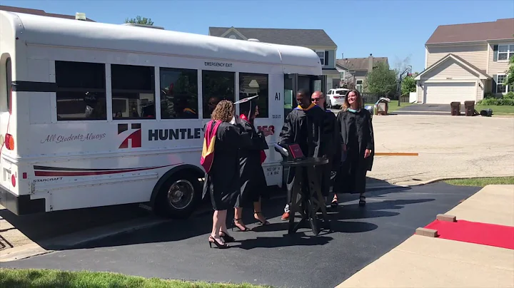 Huntley High School delivers diplomas to students in traveling graduation ceremony