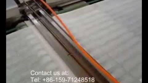 lap sponge folding machine.wmv