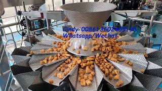 Fried food packaging machine with precise multi heads weighing  dispensing.