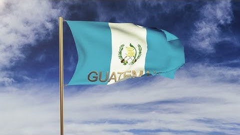 4K Guatemala flag with title waving in the wind. Looping sun rises style. Animation loop Stock video