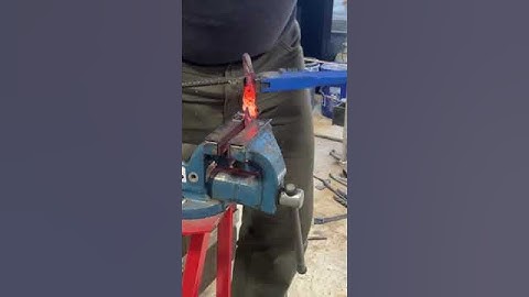 Twisting and Cleaning up a Bottle Opener  #blacksmithing #blacksmith #beer #bottleopener  #DIY