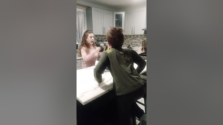 Brother and sister fighting over Nutella
