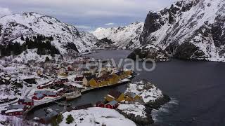 Nusfjord Fishing Village and Mountains in Winter. Lofoten Islands, Norway. Aerial View | Stock F...