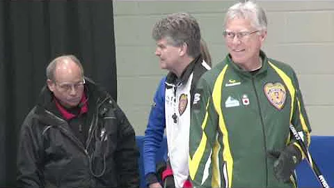 Bryan Cochrane snaps his broom in half sweeping be...