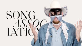 Vignette de la vidéo "Orville Peck Sings 'Daytona Sand' and Lana Del Rey in a Game of Song Association | ELLE"