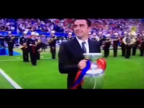 Xavi holds the trophy EURO 2016 to the "Stade de France