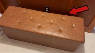 This faux leather storage ottoman is adorable and functional