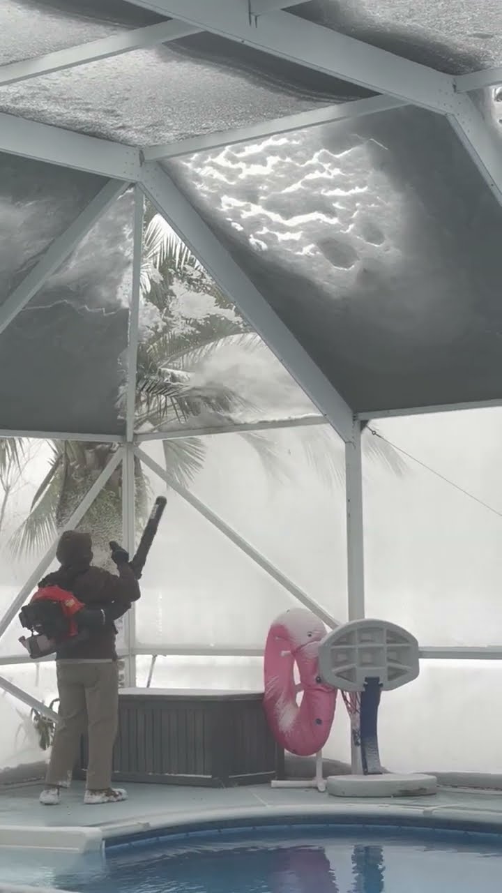 Florida Man Removes Snow From Pool Screen || ViralHog