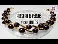 Bisuteria pulsera de perlas y canutillo .........((98))