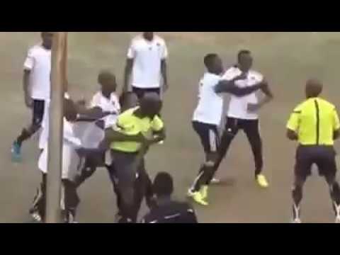 Download Referee fights Player on football park in Africa