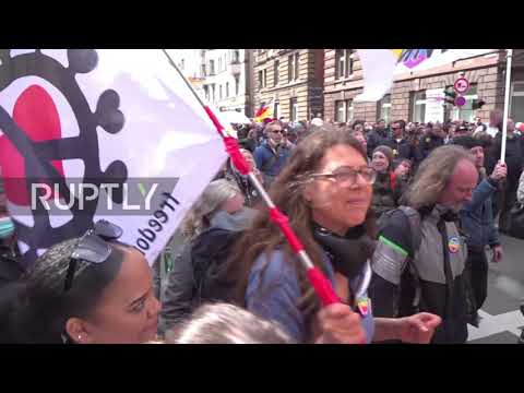 Germany: Thousands march against COVID restrix in Stuttgart