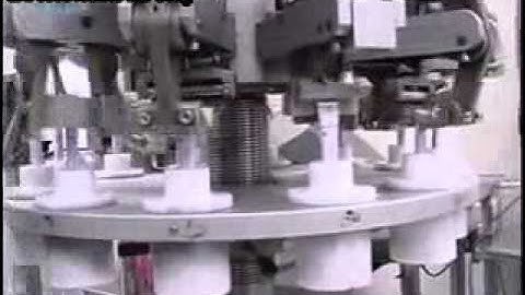 Máy chiết rót kẹp tuýp nhôm tự động