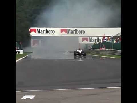 Kimi Raikkonen goes full throttle through cloud of smoke... | F1 Belgium 2002