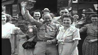 Americans in North Platte Nebraska celebrate victory over Japan in the second wor...HD Stock Footage
