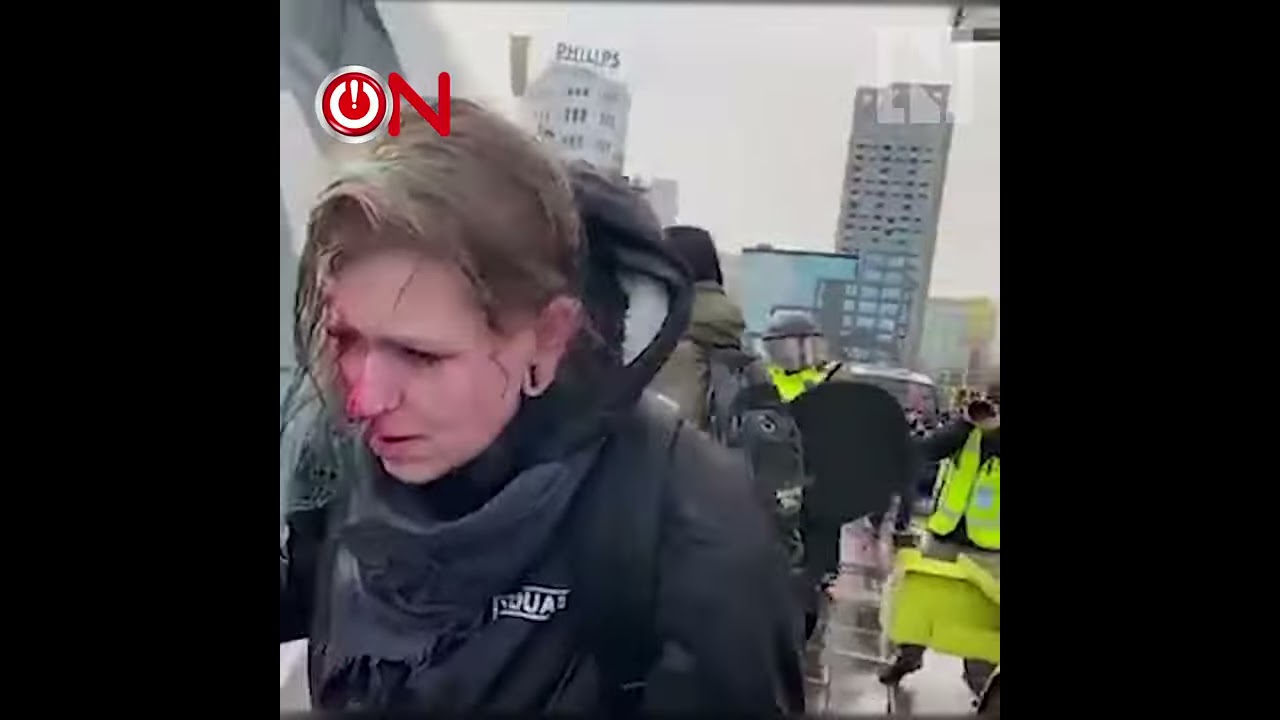 Moment Dutch Lockdown Protester Is Floored By Police Water Cannon