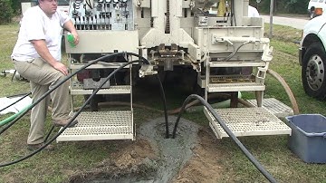 Geothermal bore hole with pipe